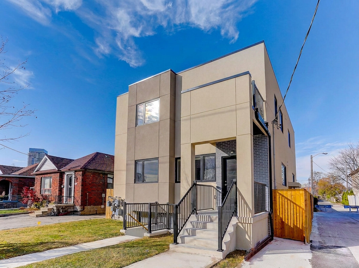 Modern fourplex exterior kept under year-round property maintenance